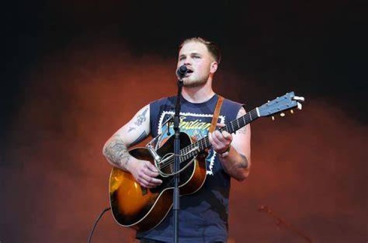 Zach Bryan Rules Emerging Artists Chart, Thanks to &lsquo;Something in the